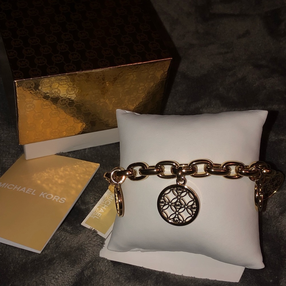 Brand New Michael Kors charm bracelet